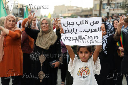 Syrian Kurds attend protest in solidarity with people in Sweida, in Qamishli