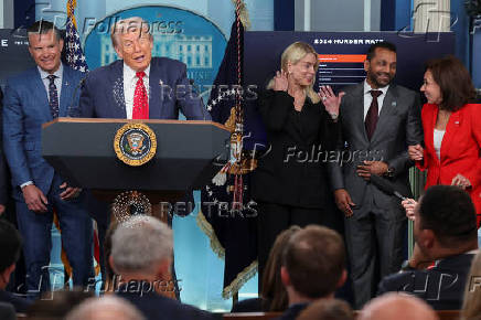 U.S. President Trump meets members of the media at the White House in Washington, D.C