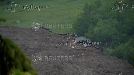 Mud and rock bury Swiss village after glacier collapse
