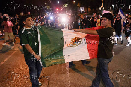 Rally in solidarity with Los Angeles protests against federal immigration sweeps, in Austin