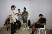 People take shelter in Tel Aviv as alert sirens sound across the country