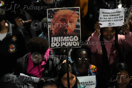 Demonstrators take part in a protest against U.S. President Donald Trump?s announcement of 50% tariffs on Brazilian products, in Sao Paulo