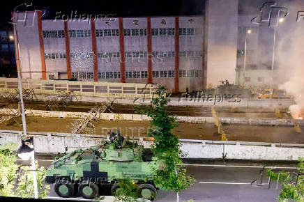 Soldiers riding a CM-34 Clouded Leopard, officially Taiwan Infantry Fighting Vehicle (TIFV), take part in the annual Han Kuang military exercises in Taipei