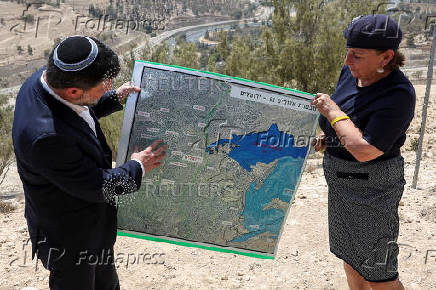 Israeli Finance Minister Smotrich speaks at a press conference regarding settlements expansion, near the Israeli settlement of Maale Adumim