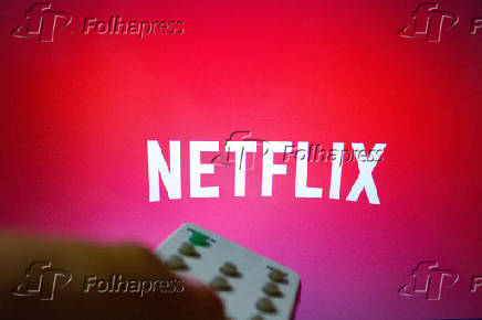 Controle remoto e o símbolo da Netflix