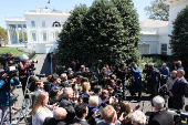 White House Press Secretary Leavitt and U.S. Secretary of the Treasury Bessent  speak to members of the media, in Washington