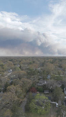 Smoke rises from a wildfire in Pine Beach