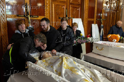 Funeral of the Tamara, Stanislav and Roman Martyniuk who were killed in a Russian missile strike in Korostyshiv