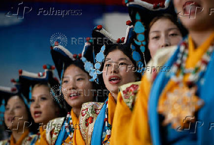 Tibetans mark the 90th birthday celebration of their spiritual leader, the Dalai Lama, at Jawalakhel Handicraft Center in Lalitpur