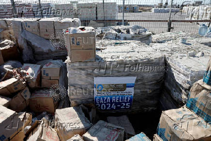 Humanitarian aid is waited to be transferred into Gaza from Israel, at the Gaza part of the Kerem Shalom crossing in the Gaza Strip