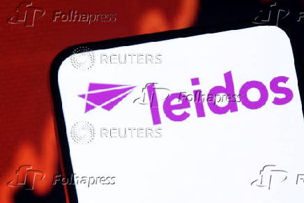 Illustration shows Leidos logo and rising stock graph