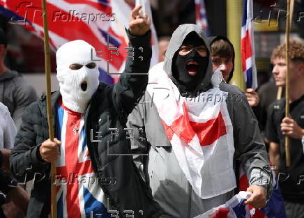 Britain First group hold 'March for Remigration' in Manchester