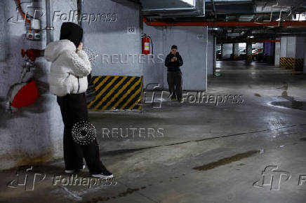 People take shelter during a Russian missile attack in Kyiv