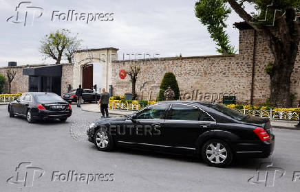 Vehicles arrive at the Turkish Presidency's Dolmabahce working office, in Istanbul