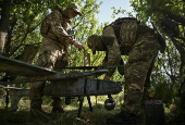 Members of the National Police Special Purpose Battalion prepare an unmanned aerial vehicle for reconnaissance flight on a front line in Zaporizhzhia Region