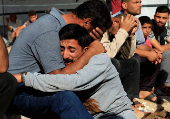 Funeral of Palestinians killed in Israeli strikes, at Nasser hospital, in Khan Younis, southern Gaza Strip