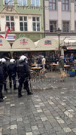 Police stands guard during clashes between Chelsea FC and Real Betis soccer fans, ahead of  Conference League final in Wroclaw