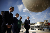 French President Macron visits reinstallation site of Olympic cauldron in Paris