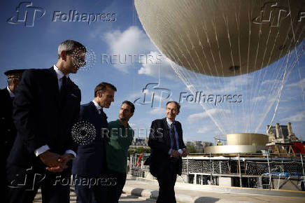 French President Macron visits reinstallation site of Olympic cauldron in Paris