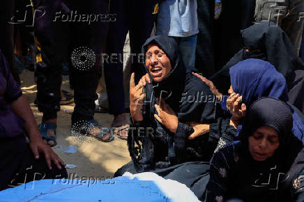 A mourner reacts during the funeral of Palestinians killed in what the Gaza Health Ministry said were Israeli airstrikes, in Khan Younis