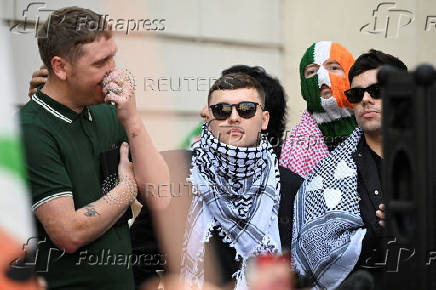 Member of Irish rap group Kneecap in UK court on terrorism charge