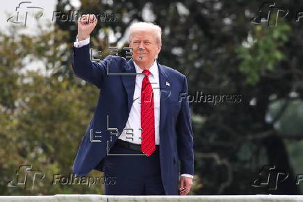 US President Trump walks on roof of the West Wing of the White House