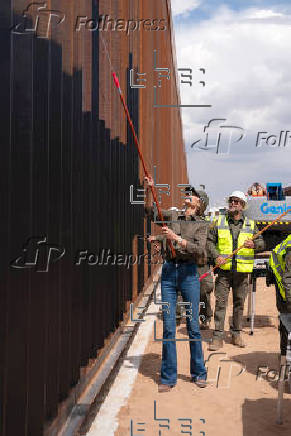 EEUU pinta de negro el muro fronterizo para elevar su temperatura y evitar escaladas