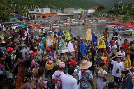 People celebrate Saint John the Baptist, in Ocumare de la costa