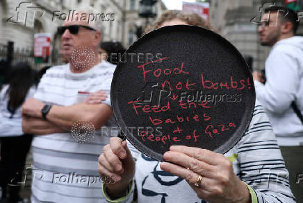 Pro-Palestinian demonstrators gather outside Downing Street, in London