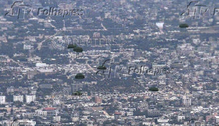 Humanitarian aid packages from Egypt are airdropped over Gaza