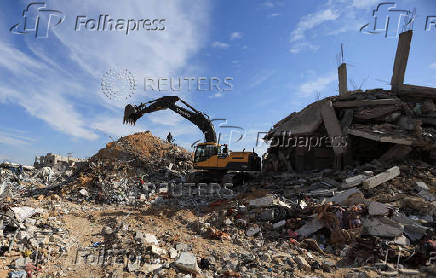 Heavy machinery operates at a site as as Hamas says it continues to search for the bodies of deceased hostages, in Beit Lahiya