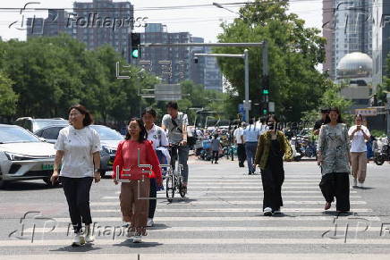 Beijing issues orange alert for heatwave