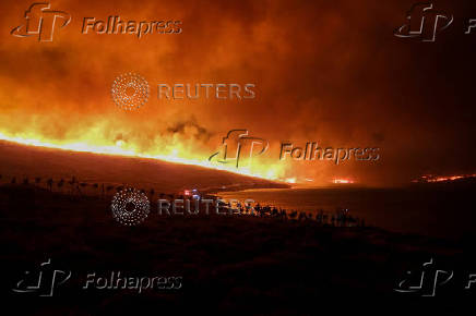 A wildfire burns near Alacati in Izmir province