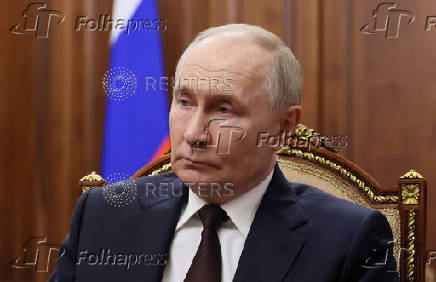 Russian President Vladimir Putin appoints Andrei Nikitin acting transport minister, in Moscow