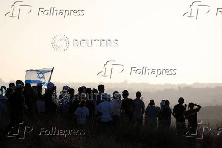 Israeli right wing activists take part in a rally organized by settlers groups to promote Israel's resettling in Gaza