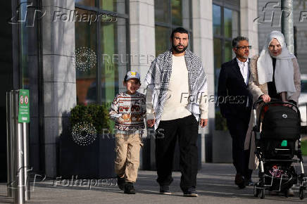 Pro-Palestinian commentator Sami Hamdi arrives in London after U.S. detention