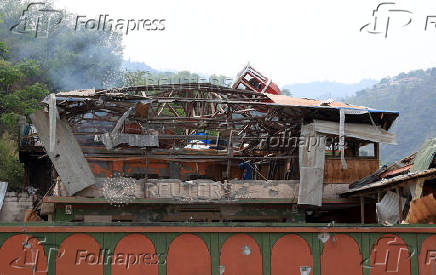 Smoke rises from Bilal Mosque after it was hit by an Indian strike in Muzaffarabad