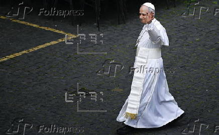 Pope Leo XIV leads Regina Caeli prayer from the Central Loggia of St. Peter's Basilica