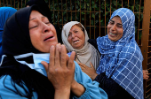 Funeral of Palestinians killed in Israeli strikes, in Khan Younis