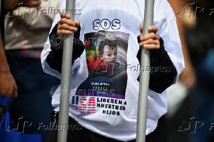 Demonstrators march to demand the return of Venezuelan migrant children after their parents were deported from the U.S., in Caracas