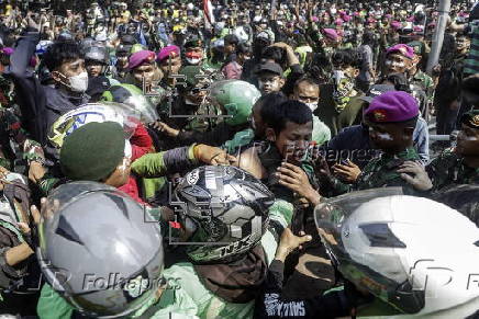 Motorcycle driver's death sparks protests in Jakarta