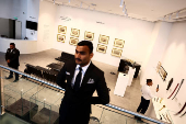 Security personnel stand guard with from Sotheby's 