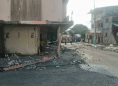 Damaged buildings after an earthquake struck near the coast of Ecuador