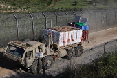 Druze community sends aid to relatives in Syria via Golan Heights