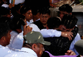Grisly Peru mining murders spotlight 