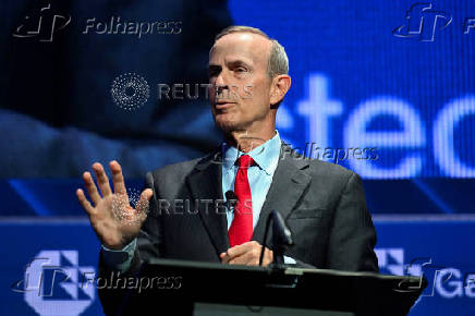 FILE PHOTO: Chevron's CEO, Michael Wirth, speaks at a conference in Houston