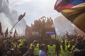 Players of Bologna FC and fans celebrate in Bologna