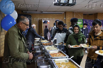 Khizra Mosque hosts a lunch as part of its Eid al-Adha celebrations, in Manchester