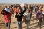 Visual story on the ordeal Gazans endure to get food under new aid distribution programme in Khan Younis