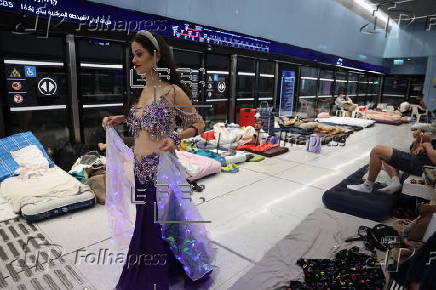 People shelter at Tel Aviv Light Rail Station amid ongoing Iranian ballistic missile threat